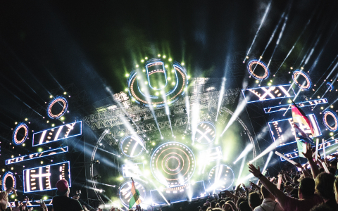 Concert Lights with Crowd with Arms Raised